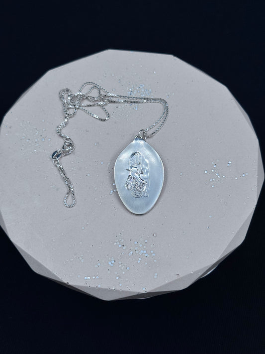 Vintage sølvsmykke Rolex med logo flat versjon