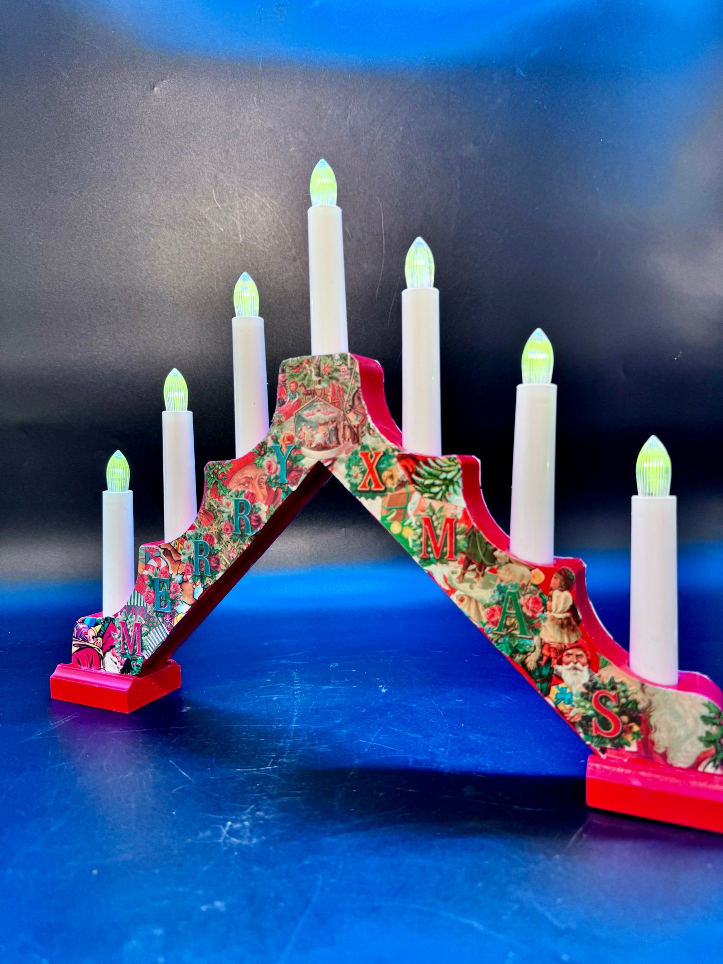 Adventstake med gamle juleglansbilder