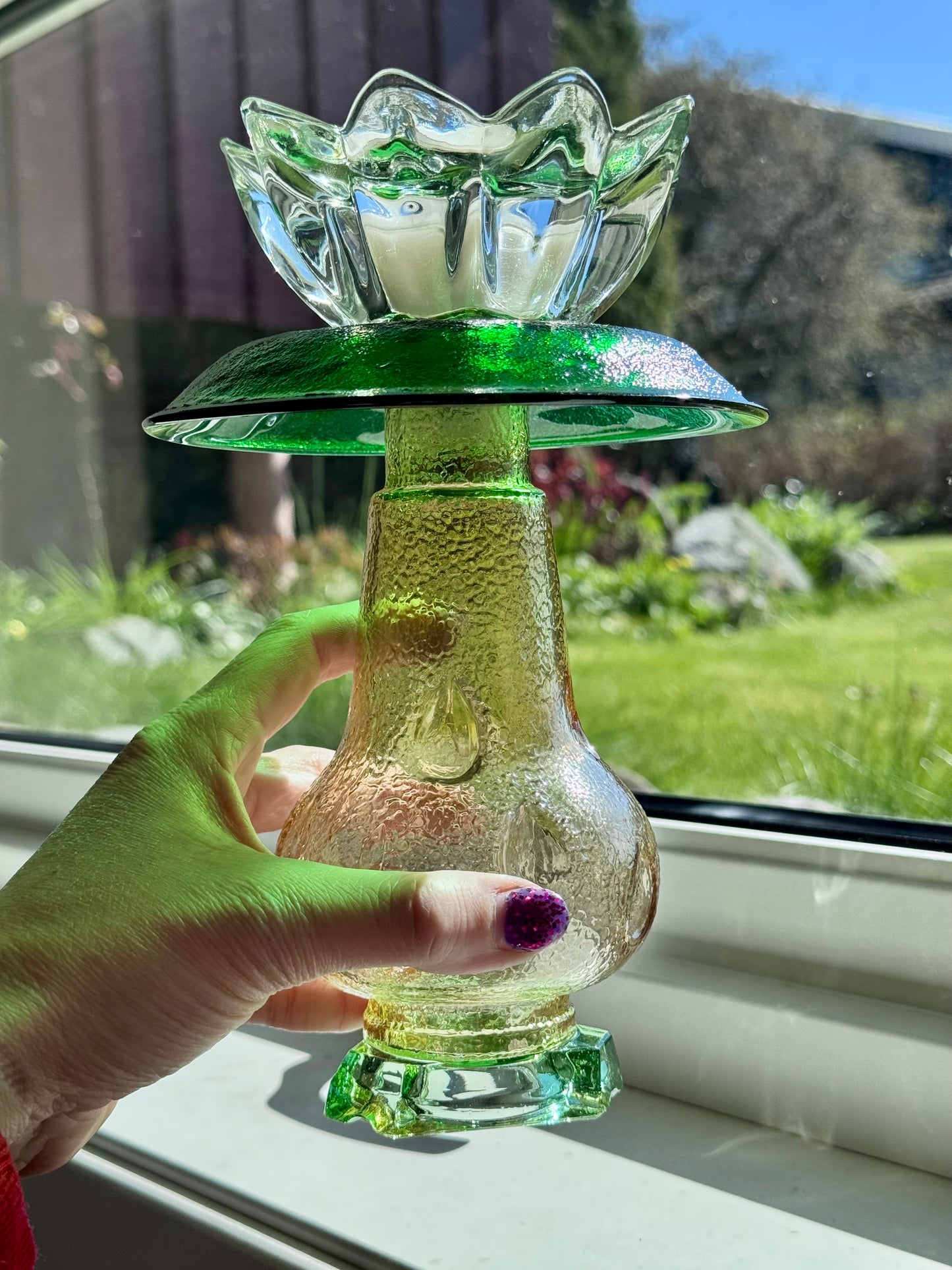 Vintage lysestake av champagne kuppel og grønne detaljer